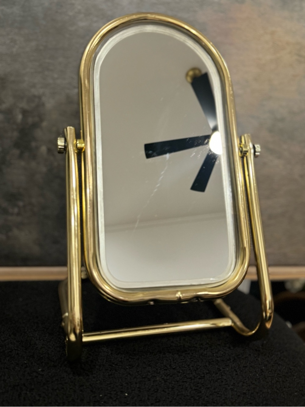 Vintage brass-tone tubular arched tabletop swivel vanity mirror